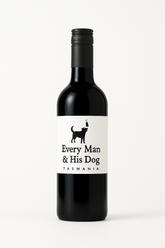 Wine bottle labeled 'Every Man & His Dog Tasmania' on a white background